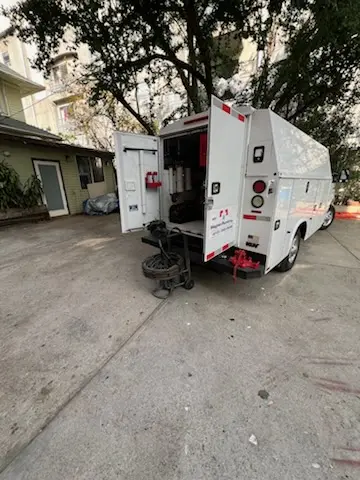 Magnet Plumbing service vehicle on-site for Grease Trap Cleaning in Ai